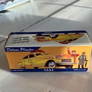 NIB Collectible American Dime Store Deluxe Plastic “City Cab”. 1:43, #20070